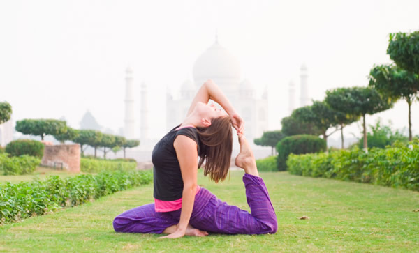 Yoga Asanas in front of Taj Mahal
