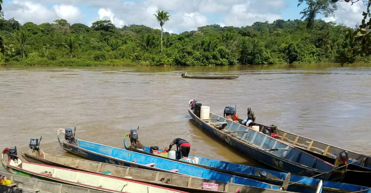 Long boats were the only way to visit most of the health clinics in Suriname.
