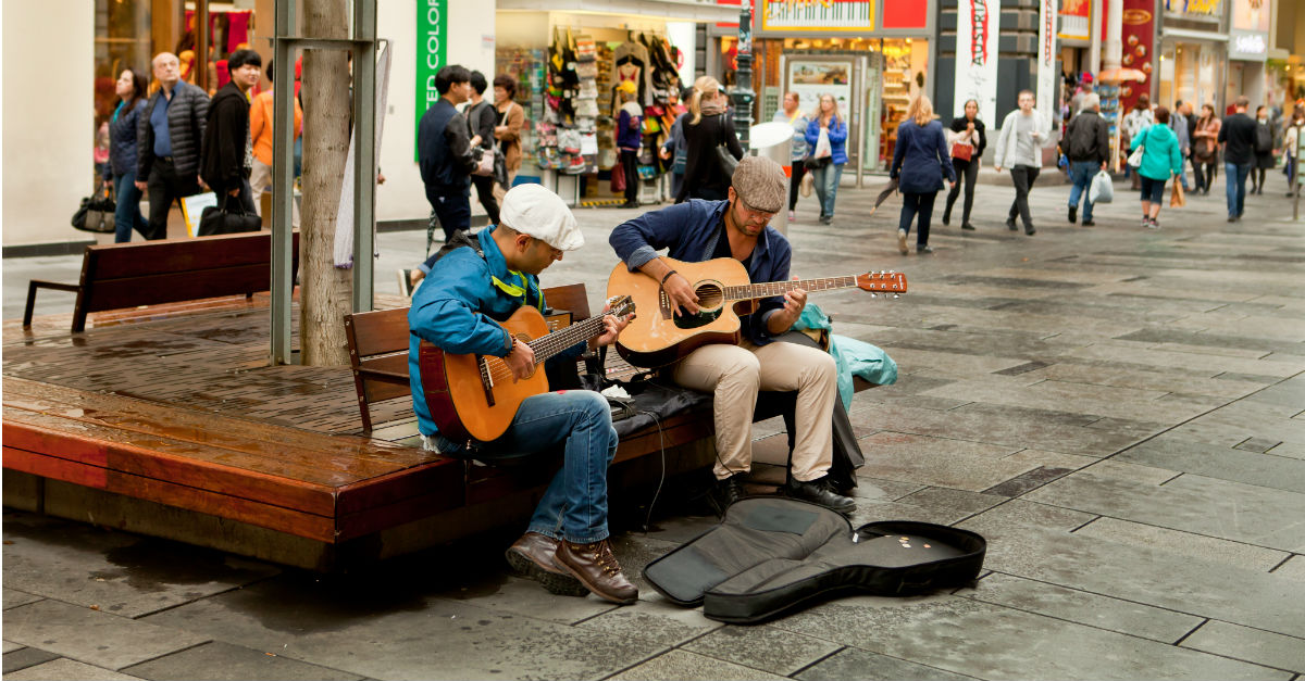 Street performing is one of many ways to earn money while abroad.