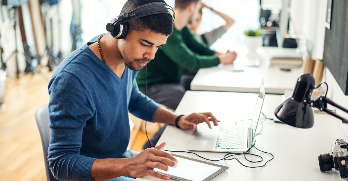 For many employees, music may actually improve their work.