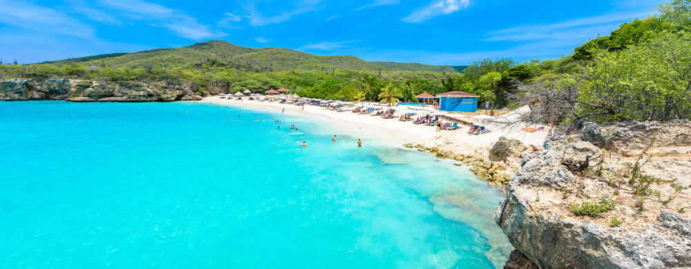 Crystal clear water and fantastic sights bring travelers to Curacao. Let Passport Health help you stay healthy while you're there with travel advice and more.