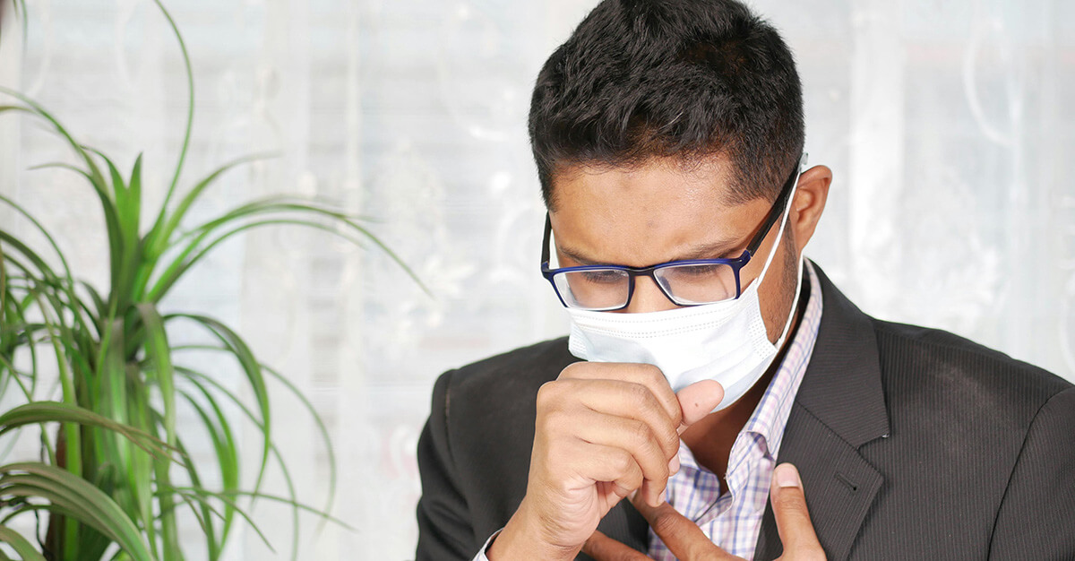 A Man in Black Suit Jacket Wearing Eyeglasses
