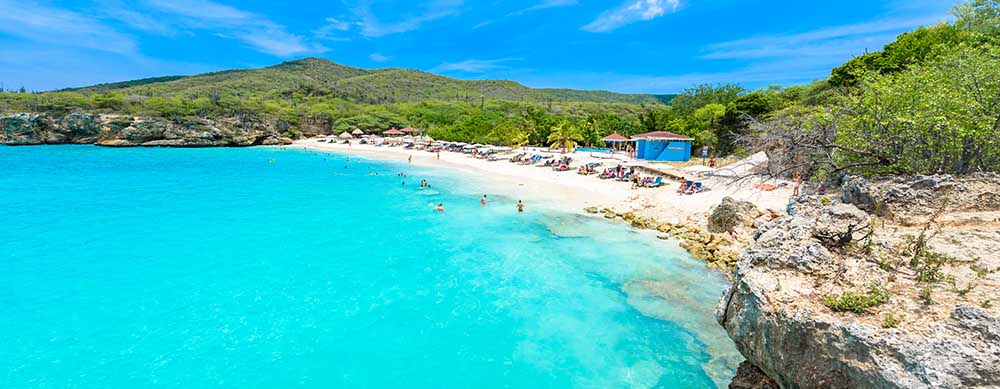 Crystal clear water and fantastic sights bring travelers to Curacao. Let Passport Health help you stay healthy while you're there with travel advice and more.