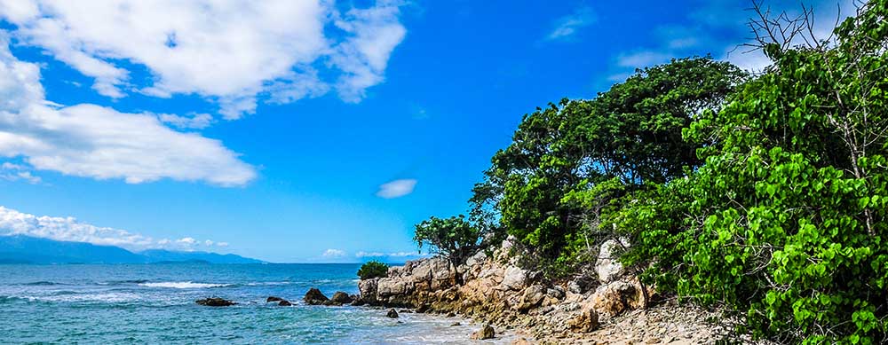 Calm beaches and serene scenes can be found throughout Haiti. Enjoy it with peace of mind with travel vaccination and medication services from Passport Health.